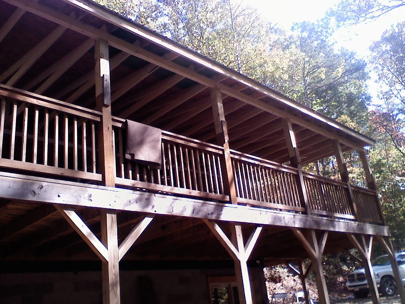 Timber framing under a new elevated porch and deck — Roof Leak Repair in Lake Placid by Roofing Brothers